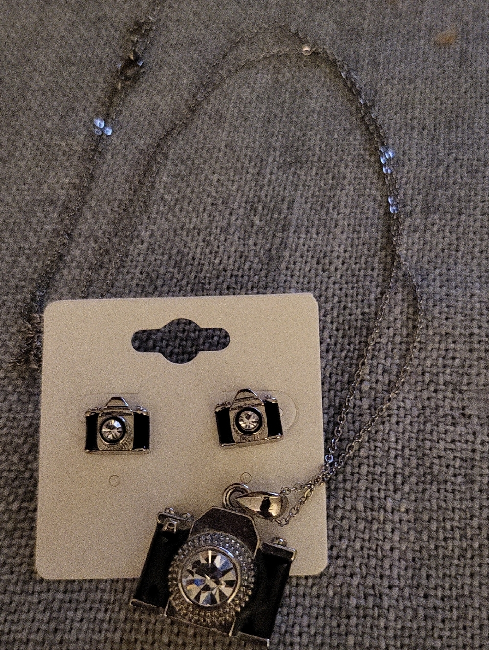 Unbranded Black Camera Pendant with Long Silver Chain and Matching Stud Earrings